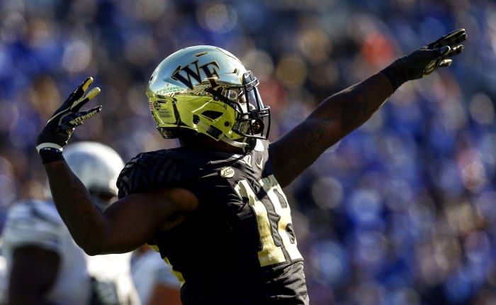 Dec 22, 2018; Birmingham, AL, United States; Wake Forest Demon Deacons defensive lineman Carlos Basham Jr. (18) celebrates after a sack on Memphis Tigers quarterback Brady White (3) during the first half of the Birmingham Bowl at Legion Field.